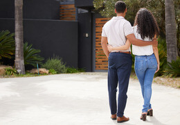 Young Couple Admiring Driveway