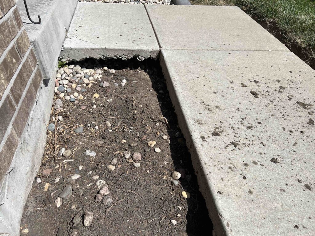Sinking Sidewalk with large void